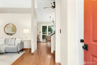 View of of the entry toward the dining room and kitchen - notice the large entry closet ready to take your guests coats - or yours!