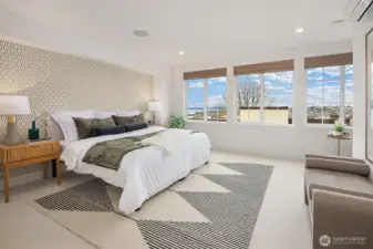 Primary suite with sprawling views of the Olympic Mountain Range and Eliott Bay
