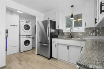 View to side door that opens to carport and back yard.