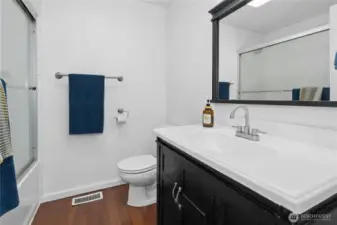 Full bath across hall from other 2 bedrooms