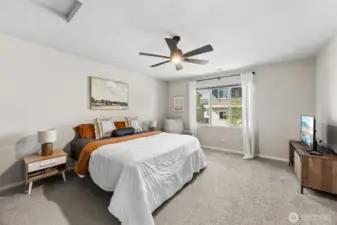 Up the stairs you have the generously sized primary bedroom