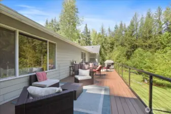 How could you not have a huge BBQ housewarming party? This deck screams entertainers delight!
