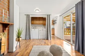 Laundry and water heater situated in the family room.