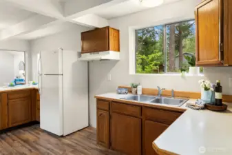 Kitchen with Wood Cabinets - Range is Provided but Not Pictured