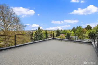 Photo from model home with similar roof deck