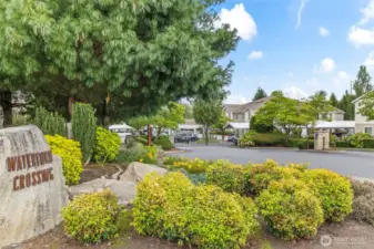 Welcome home to the phenomenal gated community of Waterford Crossing - lush grounds, covered parking, fitness center, brand new playground, and low dues that include water and trash.