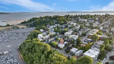 Drone shot of rooftop deck looking Southwest to Elliott Bay Marina, West Seattle and Puget Sound