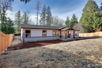 Brand new home on a half acre with fencing on both sides for back yard privacy.
