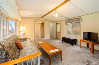 Living Room has Vaulted Ceiling