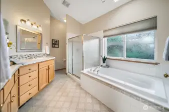 Primary ensuite with double vanity and generous storage.