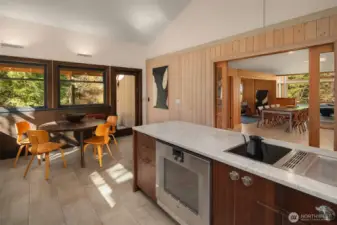 A curated, integrated suite of appliances by Miele and Gaggenau pair well with the oversized Sub-Zero refrigerator.