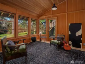 Fir panel clad sitting room on the north side of the home.
