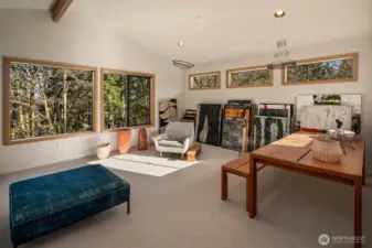 Upstairs the loft area is versatile, airy.