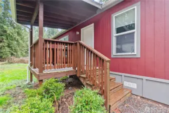 Nice, covered entry on spacious lot offering privacy and room to enjoy the outdoor space.