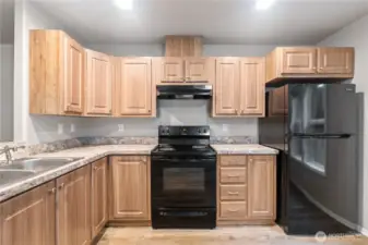 Kitchen featuring generous counter space and abundant natural light.