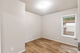 Second bedroom located off the main living area, ideal for guests or office space.