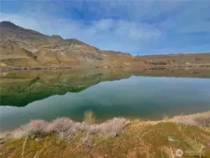 Experience refined riverfront living at 119 N Shore Dr in desirable Beebe Ranch community