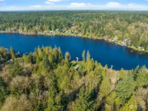 The 47 surface acre lake steps from this property is a prime destination for summer activities. With a convenient gravel boat launch, boating becomes effortless, and fishing enthusiasts will delight in the abundance of fish waiting to be caught.