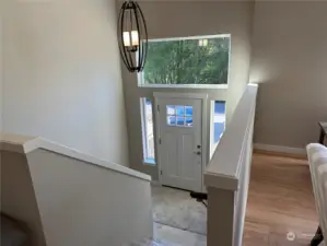Large entry landing and wide stairwell. Transit window over entry door offers wonderful natural lighting.