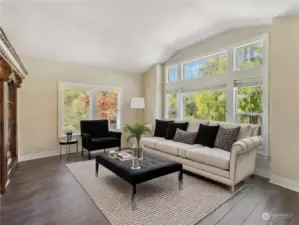 Virtual staging in this room shows what it would look like being utilized as a living room instead of a home office.