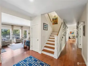 Living room, hallway and stairway to the second floor.