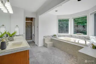 You'll love this open deluxe primary bath completing this primary suite.