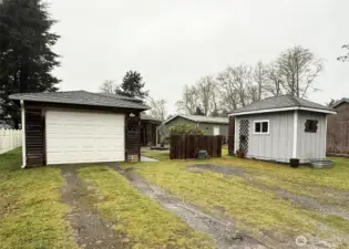 Tons of parking space in front of Garage and Shed.