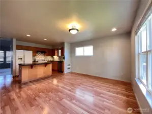 Spacious kitchen with eating area.