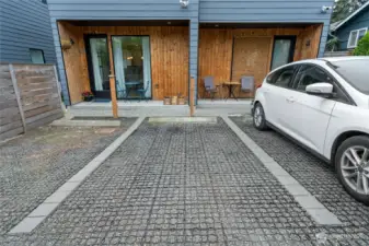 Private parking space off of alley equipped with EV Charger.