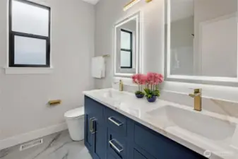 En-suite bath in primary (Photos from lot 9B, digitally staged)