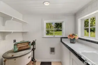 Second laundry room located in the east wing- no need to share the main Laundry area- offering more privacy.