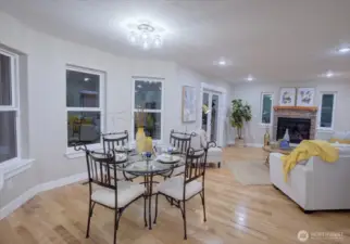Dining and living room are inviting, with lots of windows and light.