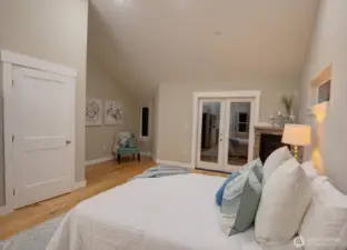#1 Super suite on top level, with french doors out to view deck.