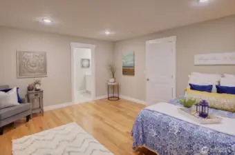 This is the Primary suite on the middle level. Very spacious, with sliding doors out to the deck for sweeping views!