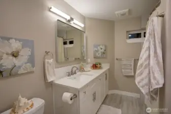 This is the hallway bathroom for the 2 other bedrooms on the middle level. It has a full shower/bathtub.