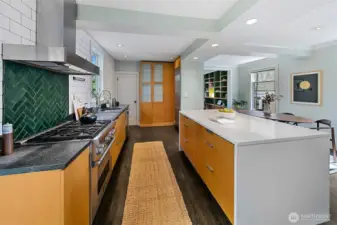 The center island creates definition of space in an elegant and thoughtful way.