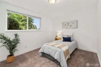 Second bedroom with a full closet and room for queen bed set or bunk beds!