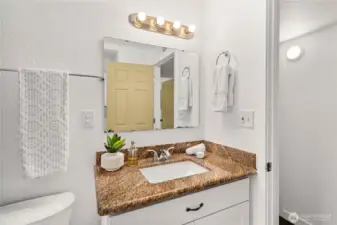 Undermount sink & granite for a bit of luxury.