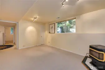 large family room with wood fireplace.