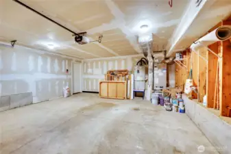 garage view of the furnace, and hot water tank