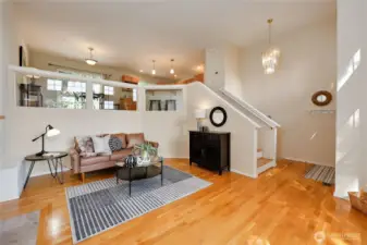 view of the entry, living room, kitchen and dining room