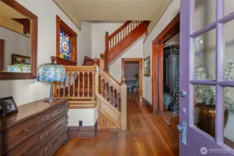 Walking up the grand from stairs and in to the foyer, you will be struck by the timeless beauty of the millwork, the high ceiling and double sliding doors that would partition the rooms to conserve heat. Teh cold is no longer a concern, but but the architectural notes of the home leave no doubt you are in one of the great homes of the Northwest.