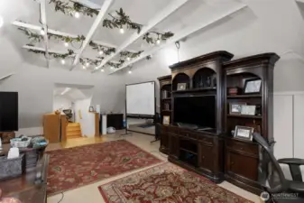 The 3rd floor departs from the victorian and has the feel of a Manhattan loft. The natural angles of the roof dictate the shape of the ceiling and living spaces. It's a really fun room with lots of light and would make a terrific main bedroom, playroom, music studio or Yoga studio!