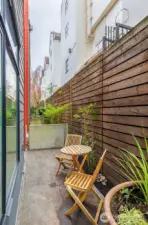 Backyard patio perfect for morning coffee & evening bbq.