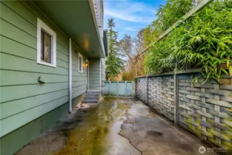 Long driveway with large gate