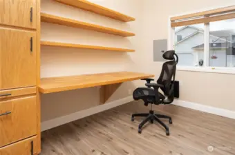 Unit C- Built-in shelving & cabinet make this room perfect office space