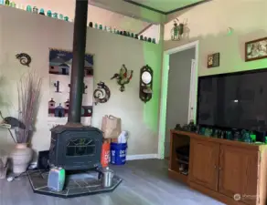 Living room wood stove heats entire home.