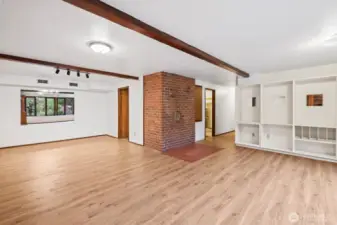 The downstairs living room provides all the space you need and has wonderful built-ins!