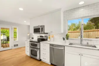 Kitchen sink window overlooks the patio.