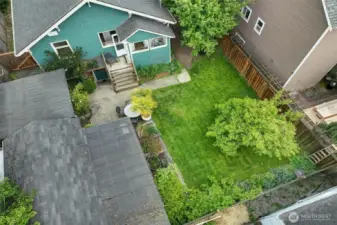 Back yard with garage/green house.